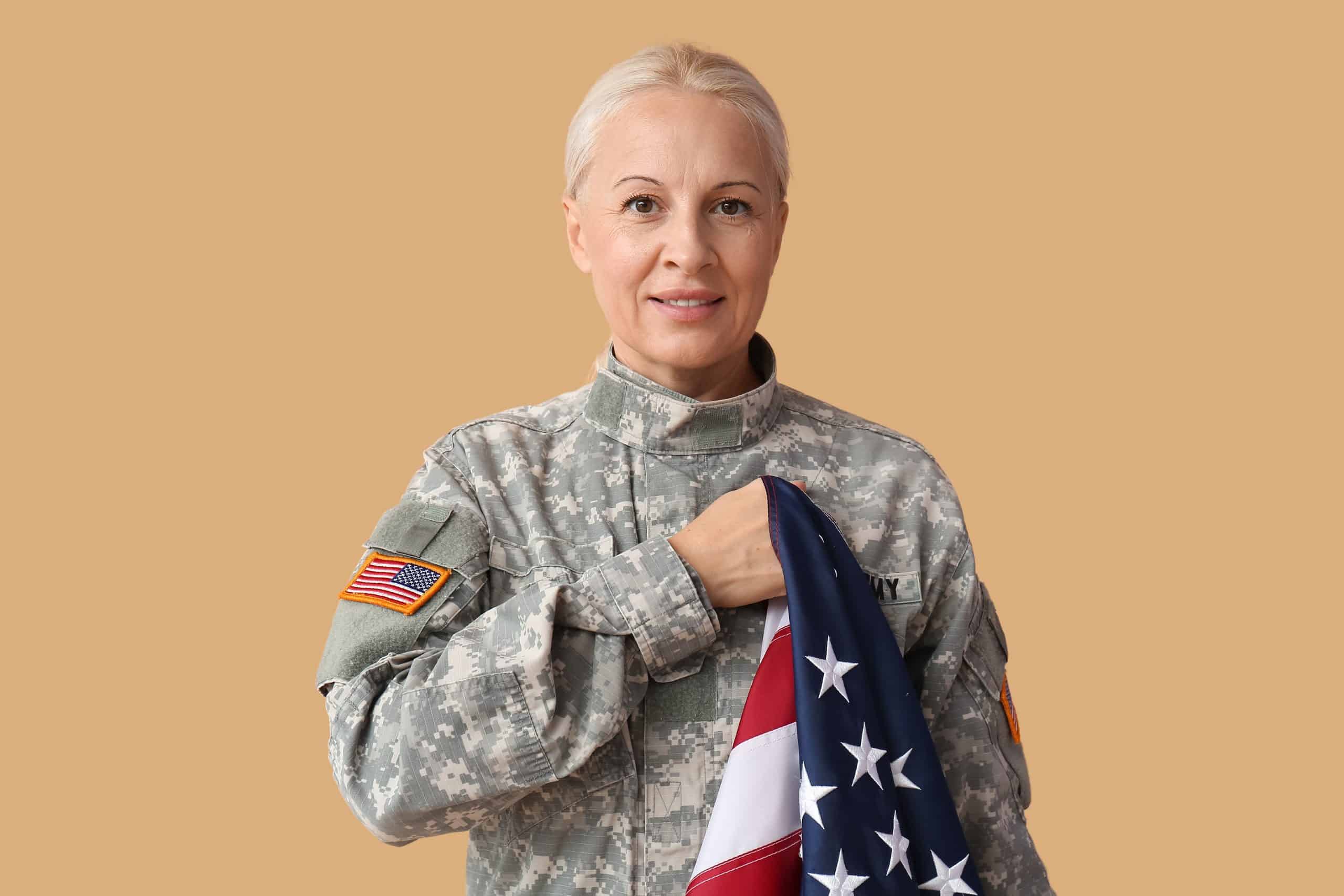 Soldier holding American flag Soldier holding American flag